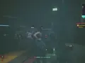 Kobieta w garażu obok potężnego pojazdu, gotowa na szybką i wściekłą jazdę w stylu cyberpunk.
