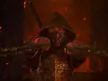 Scorpion w zbroi i kapturze, z mieczem za plecami, gotowy do walki. Kiedy Mortal Kombat 2?