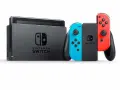 Konsola Nintendo Switch z dokiem i kontrolerami Joy-Con w kolorach niebieskim i czerwonym. Forza Nintendo Switch!