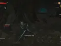 Geralt walczy z kikimorami w jaskini, szukając zaginionego brata. Misja "Wiedźmin 3 braterska miłość" w toku.
