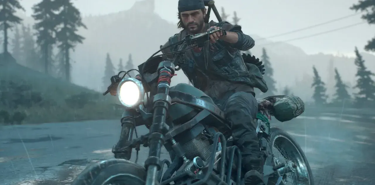 Deacon na motocyklu w deszczu, przygotowuje się do premiery Days Gone 2.