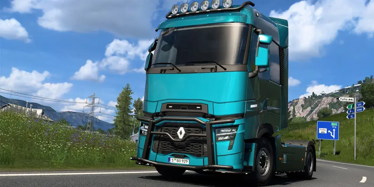 Turkusowa ciężarówka w Euro Truck Simulator 2 PS5 na górskiej drodze.