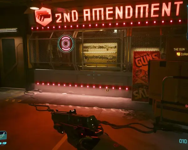 Cyberpunkowy cel: sklep z bronią "2nd Amendment" z neonowym szyldem. Gracz zbiera broń od Wilsona.