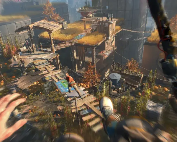 Gracz w grze Dying Light 2 na Nintendo Switch skacze między budynkami.