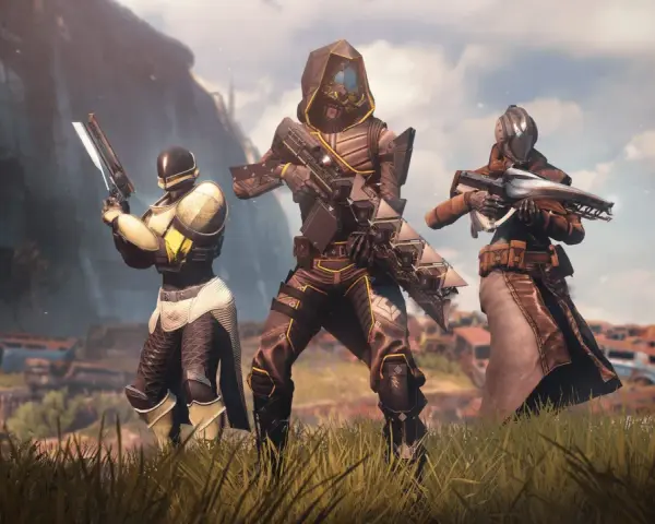 Trzech strażników w zbrojach, gotowych do walki. Ich wspólne przeznaczenie łączy graczy dzięki Destiny 2 crossplay.