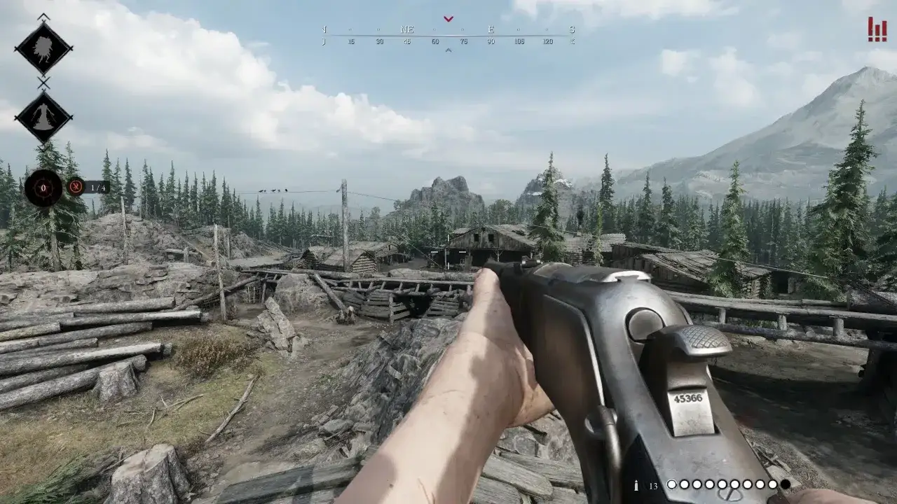 Gracz celuje z broni w grze Hunt Showdown na PS5. W tle widać zniszczoną osadę i górzysty krajobraz.