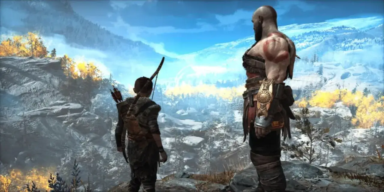 Kratos i Atreus patrzą na zimowy krajobraz. Ile godzin zajmie im ta podróż w God of War?