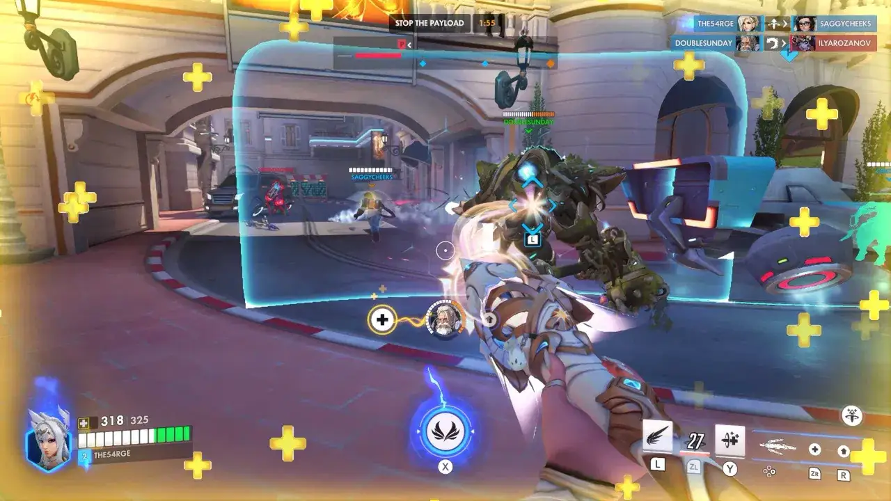 Gra Overwatch 2 na Nintendo Switch. Gracze walczą o payload, widok z perspektywy pierwszej osoby.