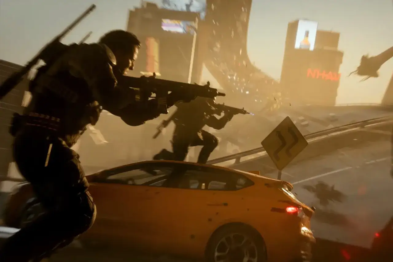 Żołnierze w akcji, strzelają zza pomarańczowego samochodu. To scena z gry black ops 7.