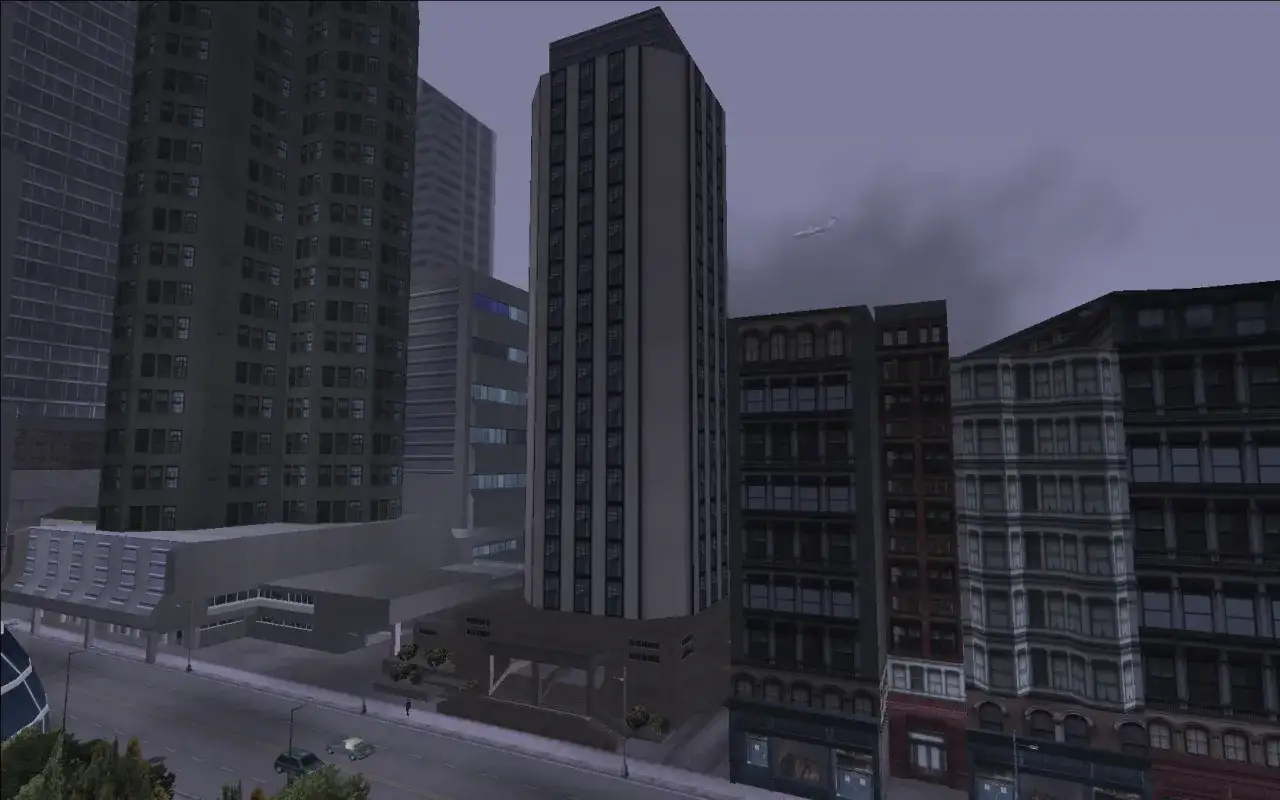 Widok na miasto z GTA 3, którego gta 3 data wydania to 2001 rok. W tle leci samolot.