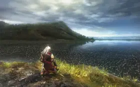 Geralt klęczy nad jeziorem, wpatrując się w horyzont. Wizualizacje z wiedzmin 1 remake zapierają dech w piersiach.